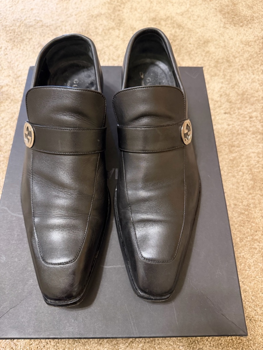 Gucci Black Leather Slip-On Loafers with Metal Logo